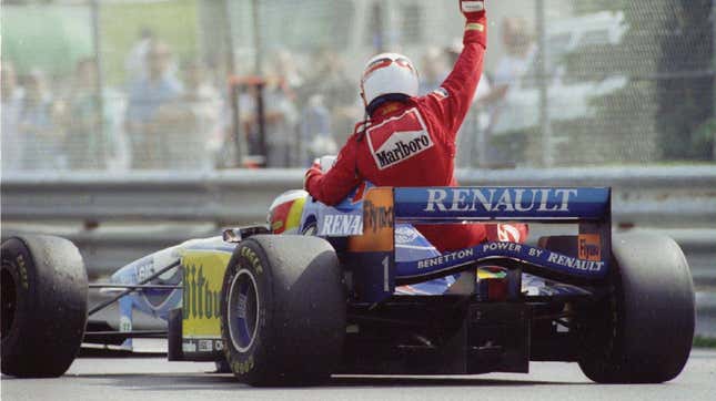 Jean Alesi celebrates his first and only Grand Prix win by hitching a ride from Michael Schumacher at the 1995 Canadian Grand Prix