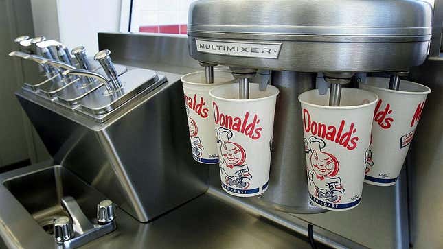 McDonald's milkshake dispenser dispensing into paper cups