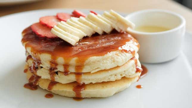 Pancakes with bananas and strawberries