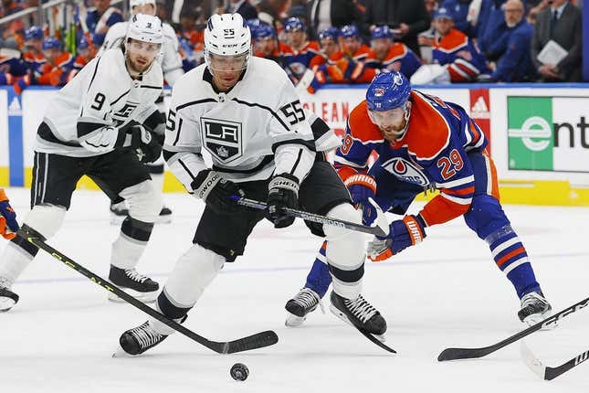 Apr 19, 2023; Edmonton, Alberta, CAN;Edmonton Oilers forward Leon Draisaitl (29) trips up Los Angeles Kings forward Quinton Byfield (55) during the second period in game two of the first round of the 2023 Stanley Cup Playoffs at Rogers Place.