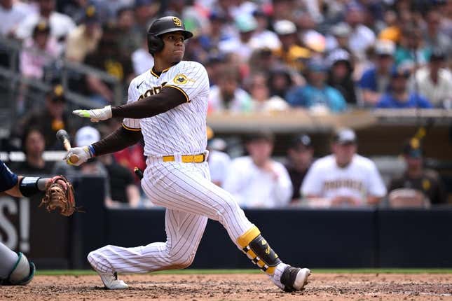 Jun 7, 2023; San Diego, California, USA; San Diego Padres left fielder Juan Soto (22) hits a two-RBI single against the Seattle Mariners during the fifth inning at Petco Park.