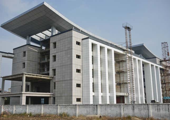 63.75 million yuan (US$10 million) on a lavish government building while its annual fiscal revenue was only 172 million with a balance of just 210,000 yuan. Wangjiang County government used 12.13 hectares of farmland to build its grandiose office building of 43,600 square meters, about eight times the size of the White House, Xinhua News Agency said.