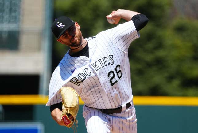 Apr 30, 2023; Denver, Colorado, USA; Colorado Rockies starting pitcher Austin Gomber (26) delivers a pitch in the first inning against the Arizona Diamondbacks at Coors Field.