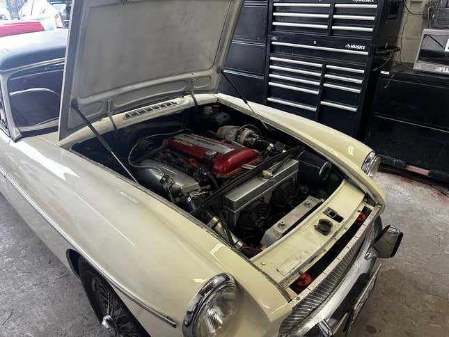 Image for article titled SR20-Swapped MG MGB, REO Speedwagon Fire Truck, Turbo K-Swapped AE86 Corolla: The Dopest Cars I Found for Sale Online