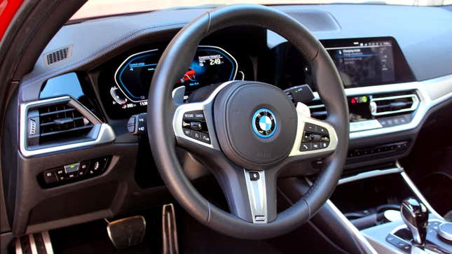 A photo of the steering wheel and dash in the BMW 330e.