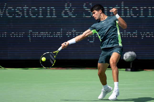 Carlos Alcaraz of Spain, hits a forehand return to Max Purcell of Australia during the quarterfinals of the Western & Southern Open at the Lindner Family Tennis Center in Mason Friday, August, 18, 2023.