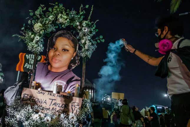 Protesters march against police brutality in Los Angeles, on September 23, 2020, following a decision on the Breonna Taylor case in Louisville, Kentucky. 
