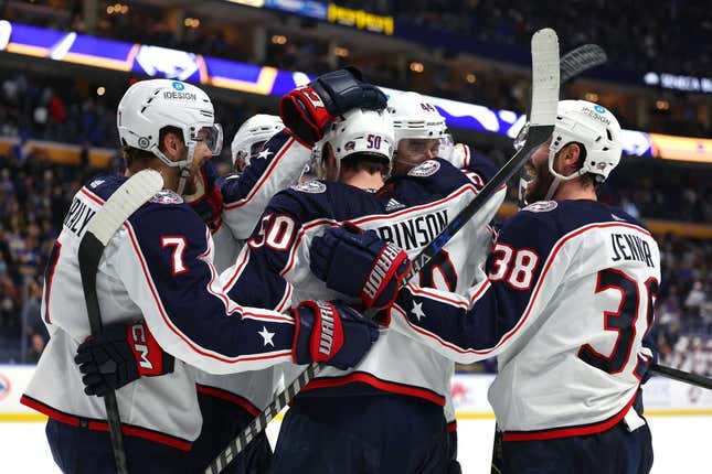 Feb 28, 2023; Buffalo, New York, USA;  Columbus Blue Jackets left wing Eric Robinson (50) celebrates his goal with teammates during the third period against the Buffalo Sabres at KeyBank Center.
