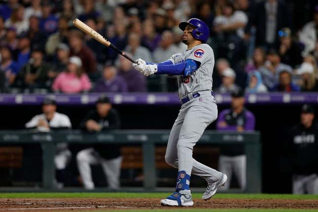 Sep 11, 2023; Denver, Colorado, USA; Chicago Cubs designated hitter Christopher Morel (5) watches his ball on a solo home run in the fifth inning against the Colorado Rockies at Coors Field.