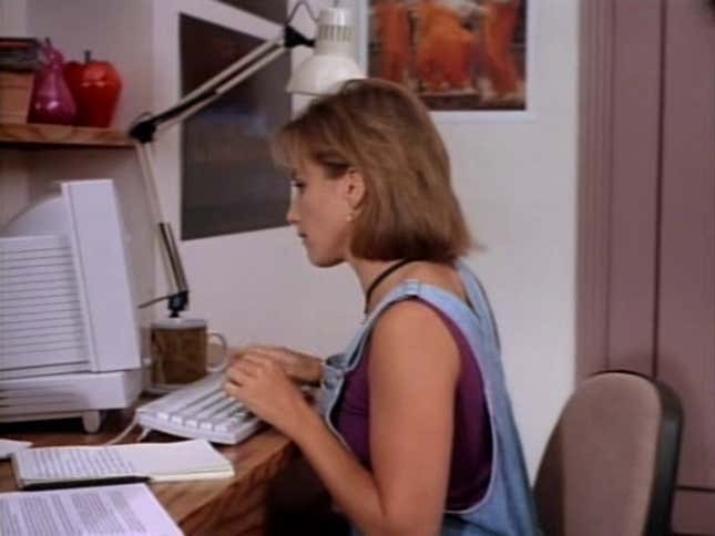 A photo of Andrea in her dorm room on a Macintosh 