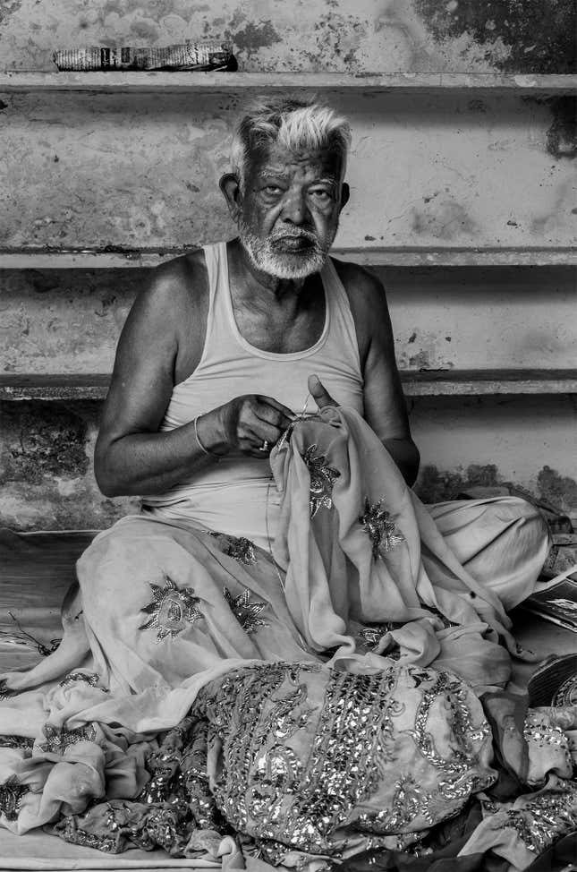 Taqi, an 80-year-old Badla artisan, working in extremely harsh conditions in the Sa-datganj Workshop, Old Lucknow.