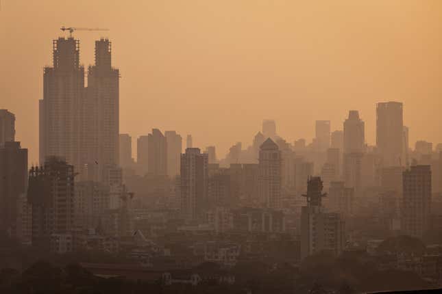 Mumbai’s past and present landscapes are forever colliding. A view from atop a government-built residential building.