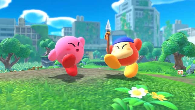 A round, pink character and his round, spear-wielding friend smile on a grassy hill.
