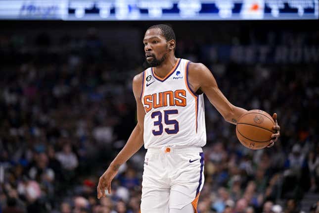 Mar 5, 2023; Dallas, Texas, USA; Phoenix Suns forward Kevin Durant (35) brings the ball up court against the Dallas Mavericks during the first quarter at the American Airlines Center.