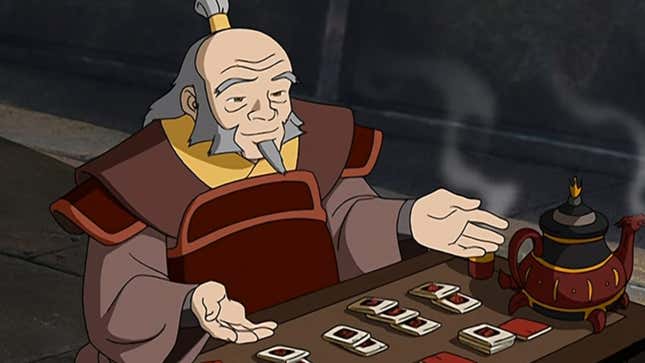The animated Uncle Iroh sits at a low table playing a tile game and drinking tea while wearing his armor.
