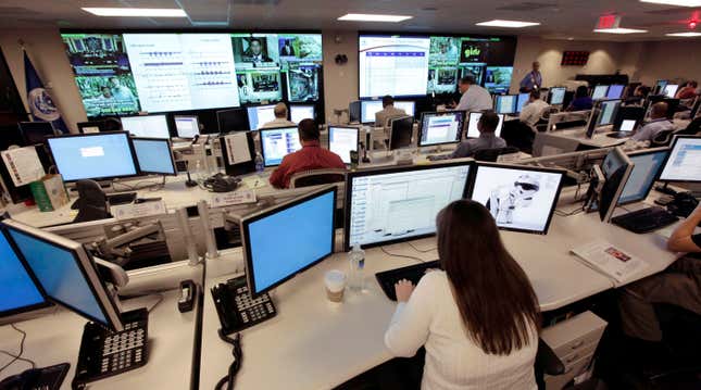 Archival photo showing at team at the National Cybersecurity &amp; Communications Integration Center (NCCIC) preparing for a hacking defence exercise.