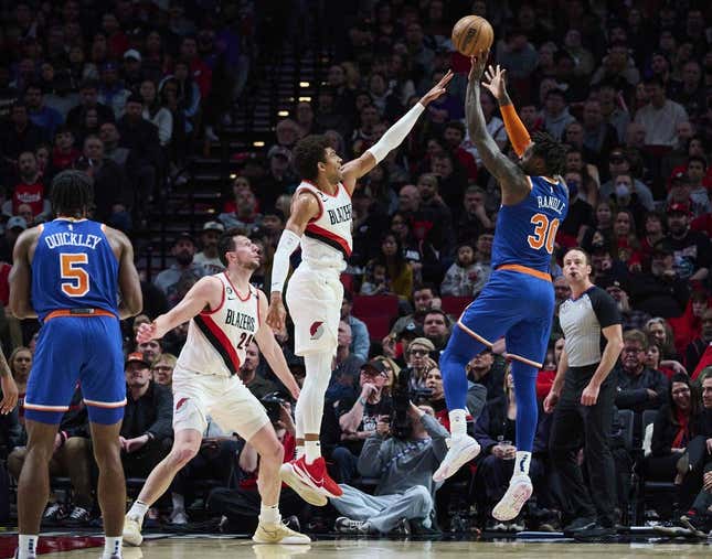 Mar 14, 2023; Portland, Oregon, USA; New York Knicks forward Julius Randle (30) shoots a jump shot during the first half against \Portland Trail Blazers guard Matisse Thybulle (4) at Moda Center.