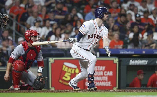 Aug 12, 2023; Houston, Texas, USA; Houston Astros right fielder Kyle Tucker (30) hits a single during the seventh inning against the Los Angeles Angels at Minute Maid Park.