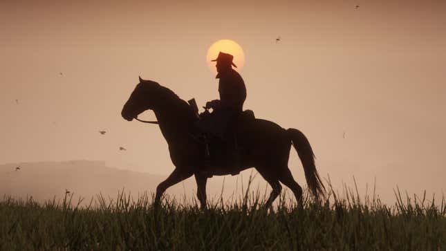 An image from Red Dead Redemption 2 depicting protagonist Arthur Morgan riding a horse in the burnt orange dusk.