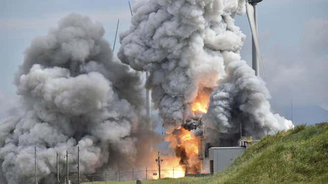 Fire breaks out and smoke rises after an engine for an Epsilon S small rocket exploded during a test at JAXA’s testing site in Noshiro, Akita Prefecture, northeastern Japan, on July 14, 2023.