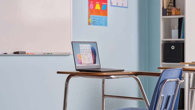 A photo of the laptop on a classroom desk 