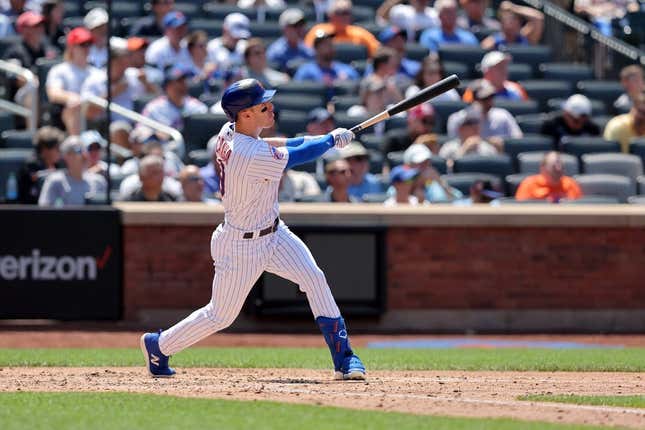 Jun 1, 2023; New York City, New York, USA; New York Mets left fielder Mark Canha (19) follows through on a two run home run against the Philadelphia Phillies during the fourth inning at Citi Field.
