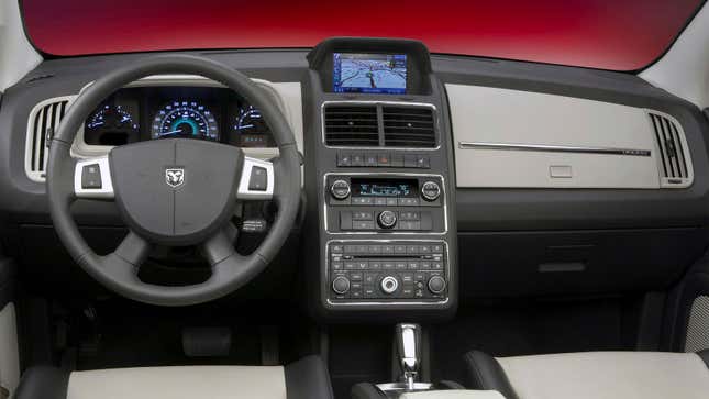 A photo of the interior of a Dodge Journey. 