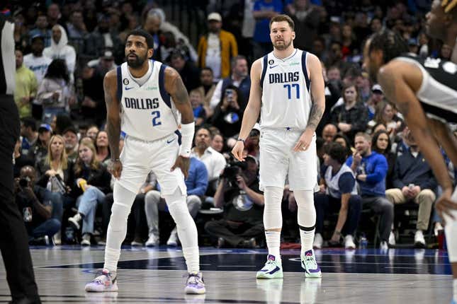 Feb 23, 2023; Dallas, Texas, USA; Dallas Mavericks guard Kyrie Irving (2) and guard Luka Doncic (77) prepare to face the San Antonio Spurs at the American Airlines Center.