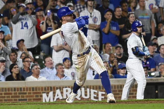 Jul 19, 2023; Chicago, Illinois, USA;  Chicago Cubs second baseman Nico Hoerner (2) his a grand slam against the Washington Nationals during the eighth inning at Wrigley Field.