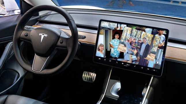 Image for article titled New Tesla ‘Memories’ Feature Displays Pictures From Driver’s Life On Dashboard Before Car Explodes