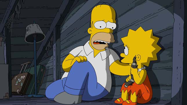 A screenshot of The Simpsons shows Homer comforting Lisa in the attic. 