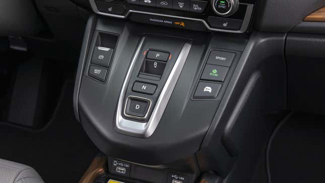 A Honda center console with buttons in place of a shifter. 