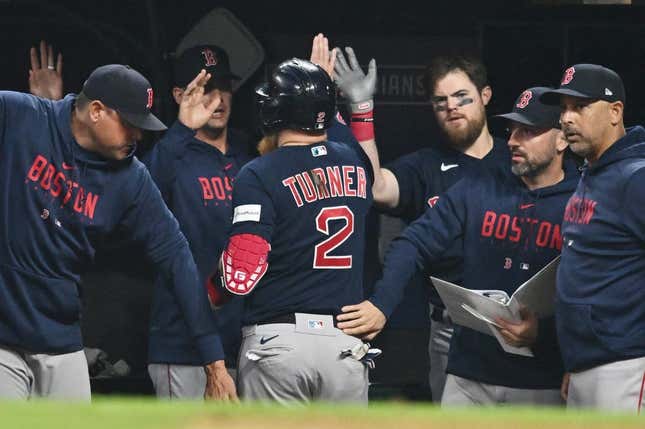 Jun 6, 2023; Cleveland, OH, USA; Boston Red Sox designated hitter Justin Turner (2) celebrates after scoring in the eighth inning against the Cleveland Guards.