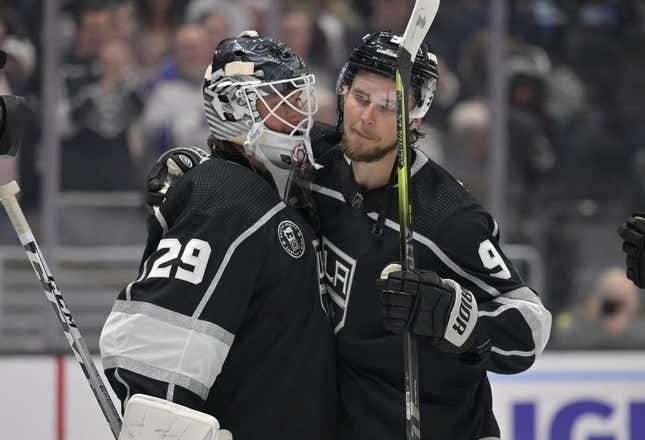 Feb 11, 2023; Los Angeles, California, USA;  Los Angeles Kings goaltender Pheonix Copley (29) is congratulated by Los Angeles Kings right wing Adrian Kempe (9) after a shutout against the Pittsburgh Penguins at Crypto.com Arena. Kempe scored four goals in the game as the first player in Kings franchise history to accomplish that record.