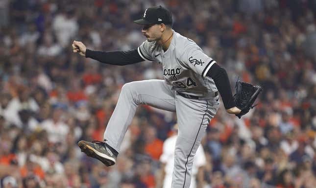 Mar 30, 2023; Houston, Texas, USA; Chicago White Sox starting pitcher Dylan Cease (84) delivers a pitch during the first inning against the Houston Astros at Minute Maid Park.