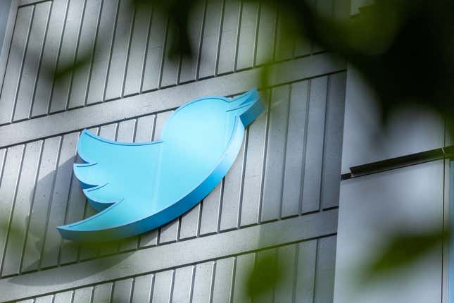 The Twitter logo is seen on a sign on the exterior of Twitter headquarters in San Francisco, California, on October 28, 2022. - After months of controversy, Elon Musk is now at the head of one of the most influential social networks on the planet, whose “tremendous potential” he has promised to unleash. 