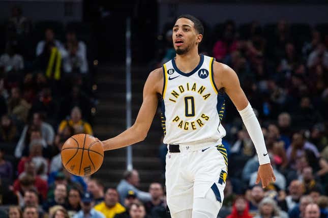 Mar 9, 2023; Indianapolis, Indiana, USA;  Indiana Pacers guard Tyrese Haliburton (0) dribbles the ball in the second quarter against the Houston Rockets at Gainbridge Fieldhouse.