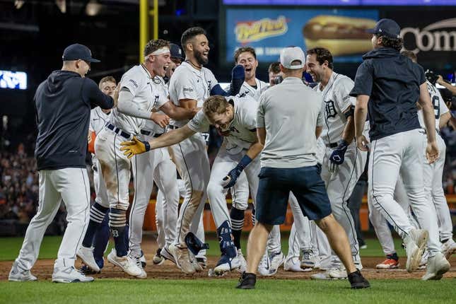 Aug 26, 2023; Detroit, Michigan, USA; Detroit Tigers center fielder Parker Meadows (22) is congratulated after hitting a walk off three run home run in the ninth inning against the Houston Astros at Comerica Park.