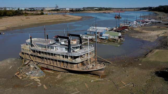The Diamond Lady, a once-majestic riverboat, rests with smaller boats in mud at Riverside Park Marina in Martin Luther King Jr. Riverside Park along the Mississippi River on October 19, 2022 in Memphis, Tennessee. 