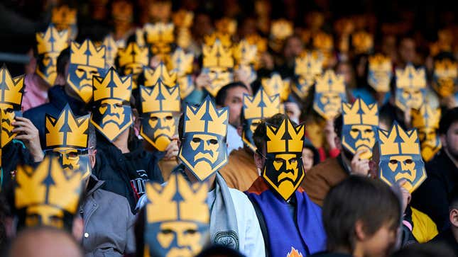 A photo of people wearing Kings League masks at Camp Nou. Gerard Piqué's Kings League broke the Guinness World Record for most people wearing costume masks.