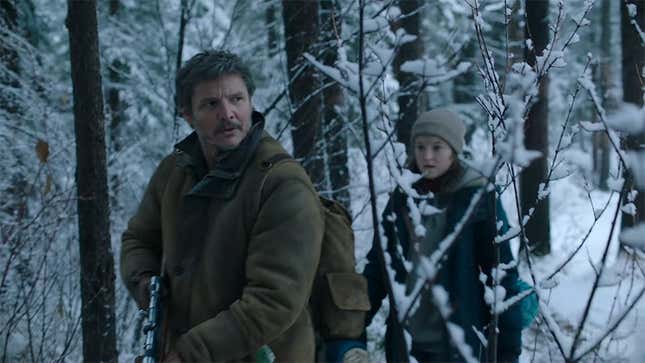 Joel and Ellie are seen walking through a snowy forest.