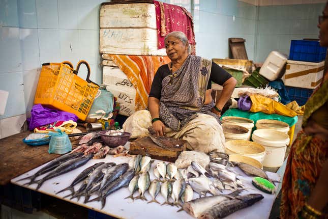 A vendor in one of the city’s oldest fish markets. As a more affluent and increasingly vegetarian population replaces former mill workers, business is suffering.