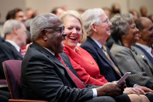 Associate Supreme Court Justice Clarence Thomas sits with his wife and conservative activist Virginia Thomas while he waits to speak at the Heritage Foundation on October 21, 2021, in Washington, DC. Clarence Thomas has now served on the Supreme Court for 30 years. He was nominated by former President George H. W. Bush in 1991 and is the second African-American to serve on the high court, following Justice Thurgood Marshall.