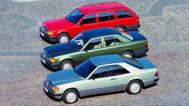 A photo of three Mercedes E Class cars from the 1980s. 