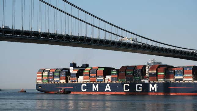 The Marco Polo, the largest cargo ship to call at an East Coast port, arrives under the Verrazzano-Narrows Bridge and into New York Harbor on May 20, 2021 in New York City. The 1,300 foot ship is owned and operated by the French transport company CMA CGM Group. The Marco Polo, which is only slightly smaller than the container ship that got stuck in Egypt’s Suez Canal in March, will arrive into the Elizabeth-Port Authority Marine Terminal and spend two days there before leaving for Norfolk, Virginia.