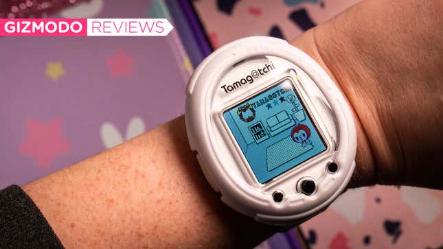 A photo of the Tamagotchi Smart worn as a smartwatch 