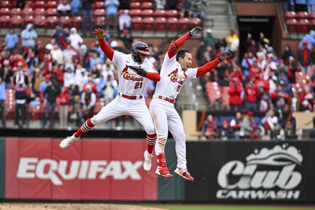 Apr 16, 2023; St. Louis, Missouri, USA; St. Louis Cardinals shortstop Tommy Edman (19) celebrates with left fielder Lars Nootbaar (21) after hitting a walk-off one run single against the Pittsburgh Pirates during the tenth inning at Busch Stadium.