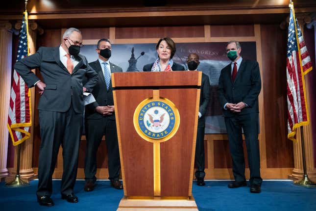 Senate Majority Leader Charles Schumer, D-N.Y., Sens. Alex Padilla, D-Calif., Amy Klobuchar, D-Minn., Raphael Warnock, D-Ga., and Jeff Merkley, D-Ore., conduct a news conference after a Senate Democrats luncheon at the U.S. Capitol on Tuesday, January 4, 2022