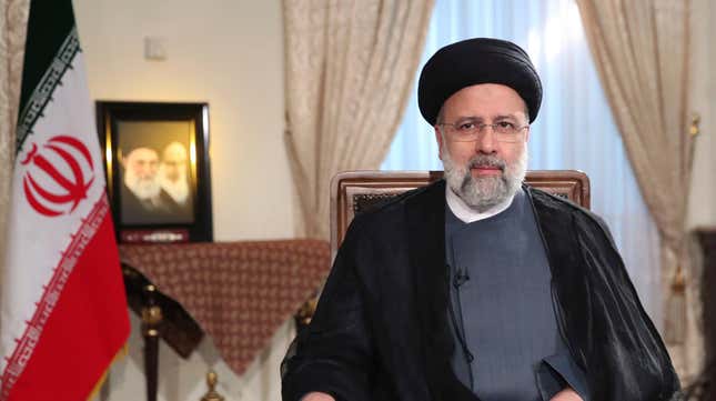 Iranian President Ebrahim Raisi seated for a live televised interview with state-run TV.