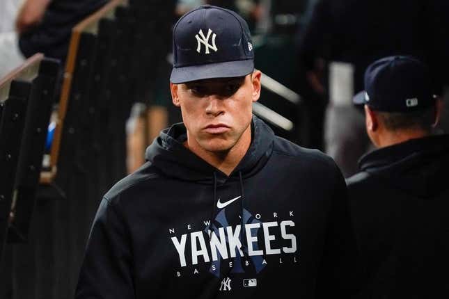 Apr 28, 2023; Arlington, Texas, USA; New York Yankees center fielder Aaron Judge (99) sits in the dugout during during the eighth inning against the Texas Rangers at Globe Life Field.